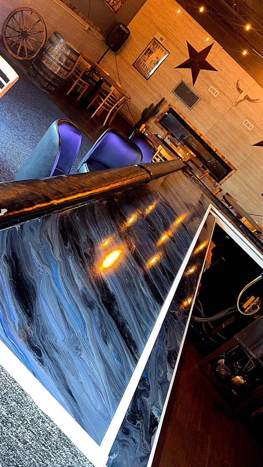 Floor grinding equipment preparing a floor for epoxy