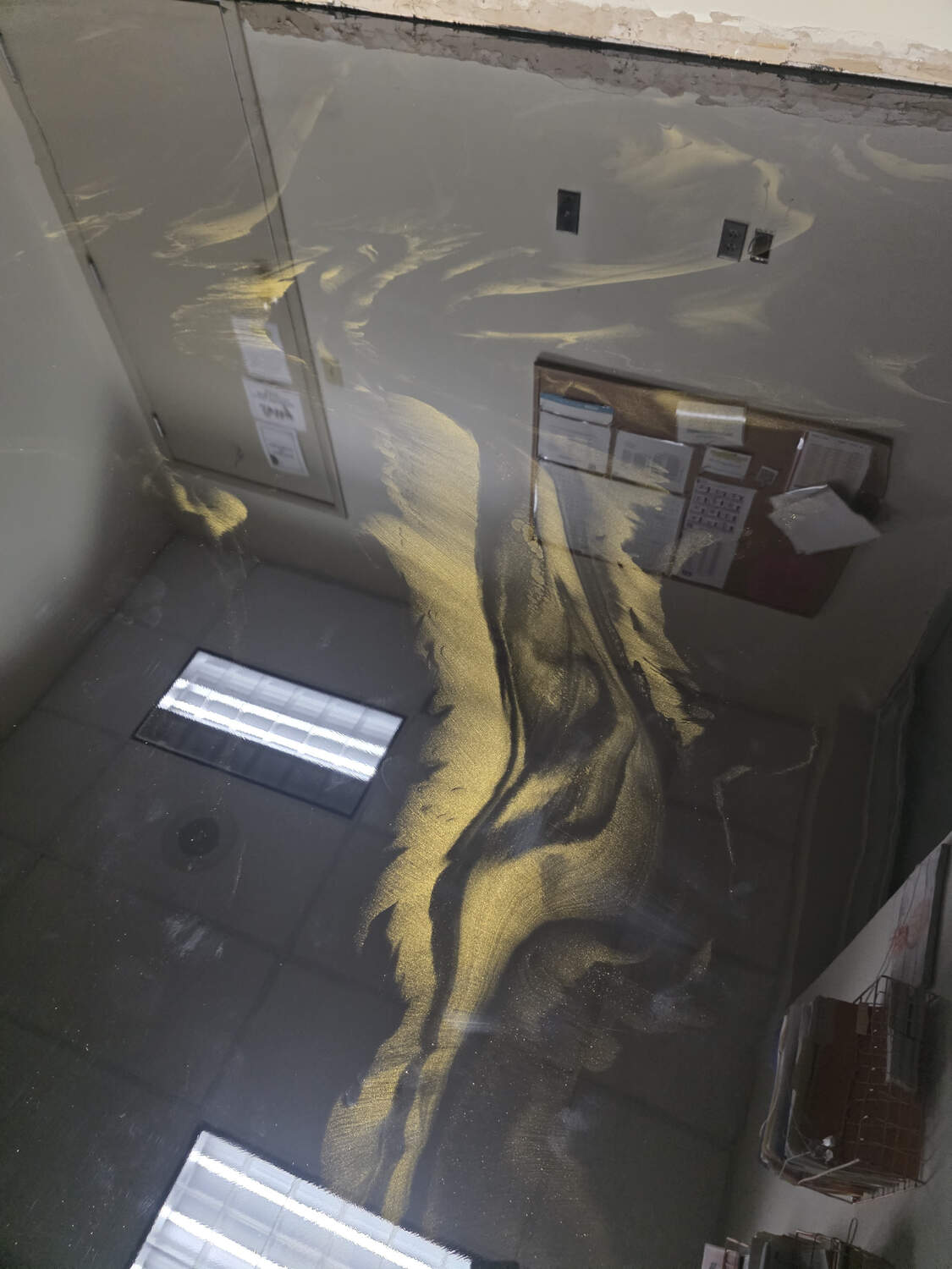 Gold and black metallic epoxy floor wide view