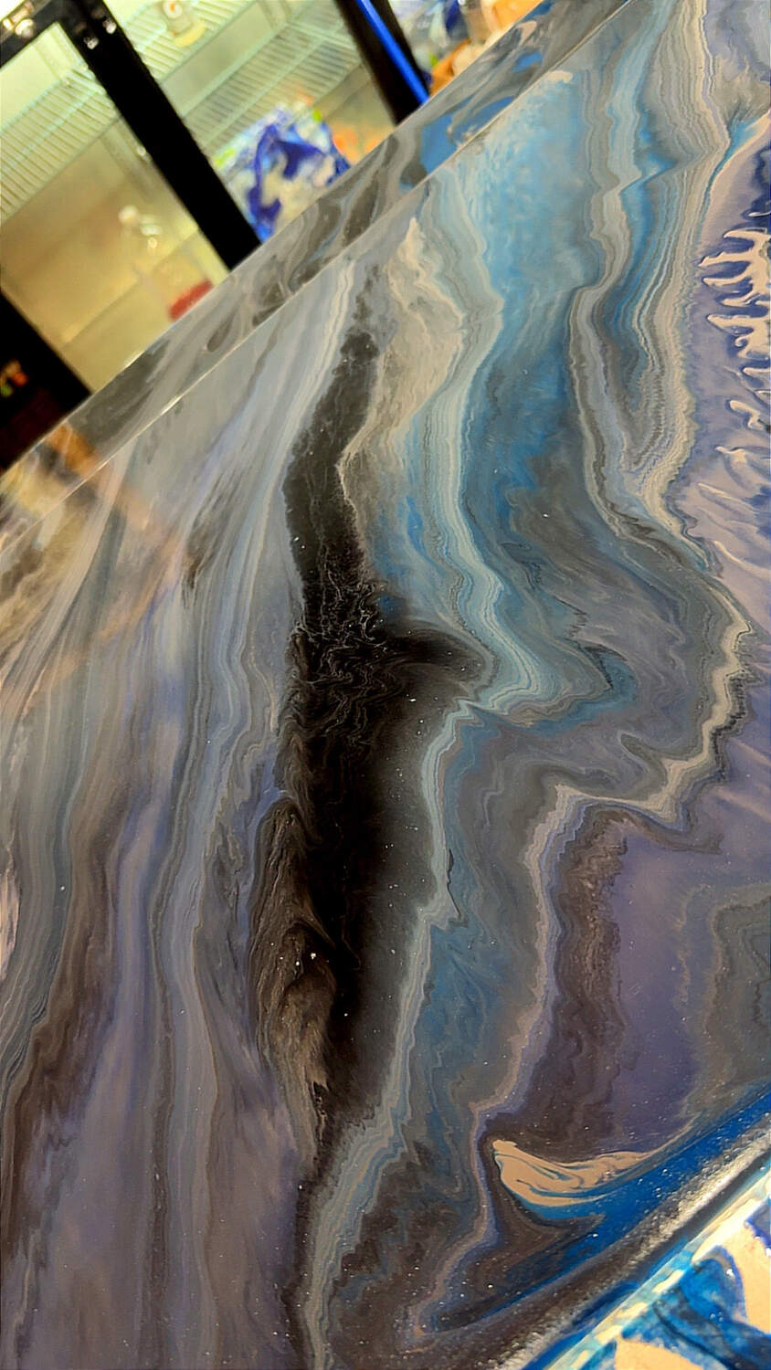 Blue and black metallic epoxy bar top