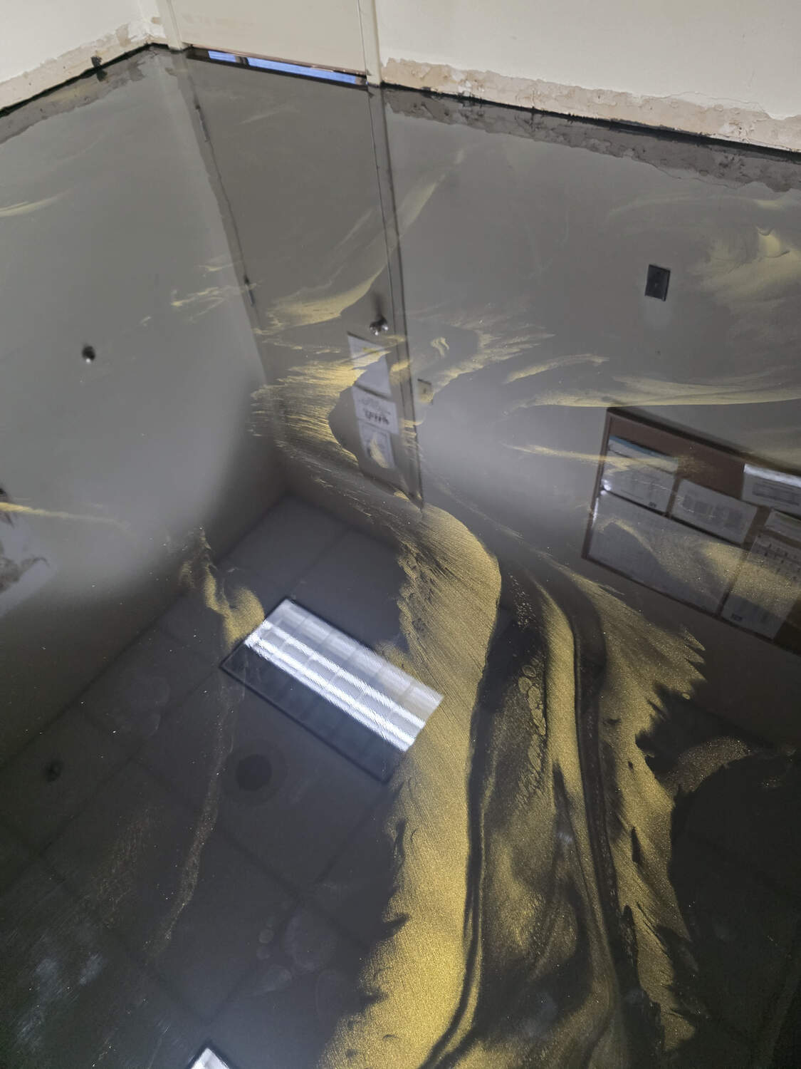 Gold and black metallic epoxy floor